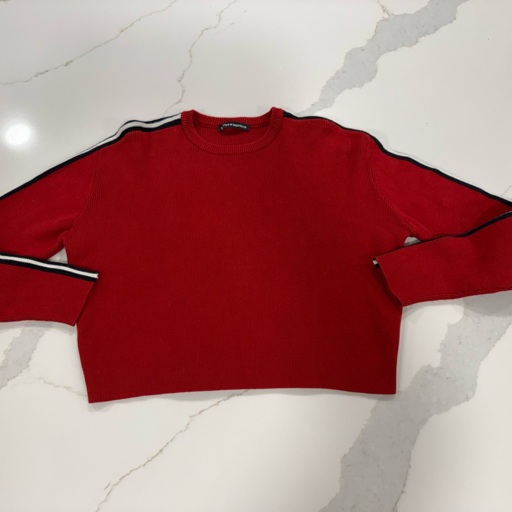 Brandy MelvilleRed Women's Sweater with a Navy and White Stripe on the sleeves.
